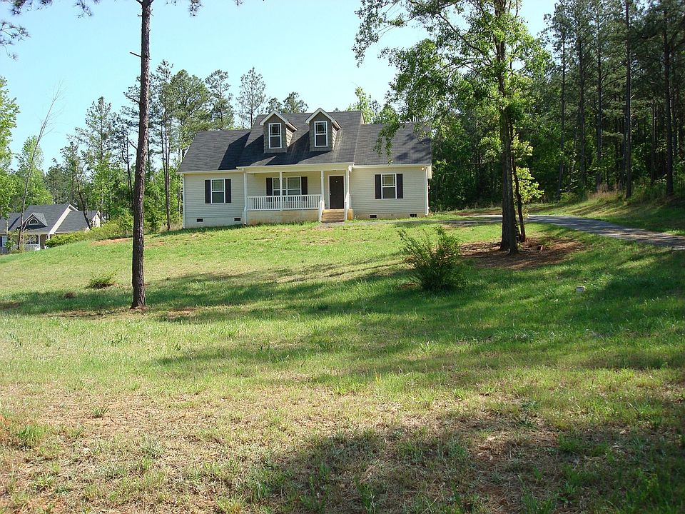 Home sits back on 2 acre lot