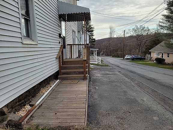 Front entrance with parking