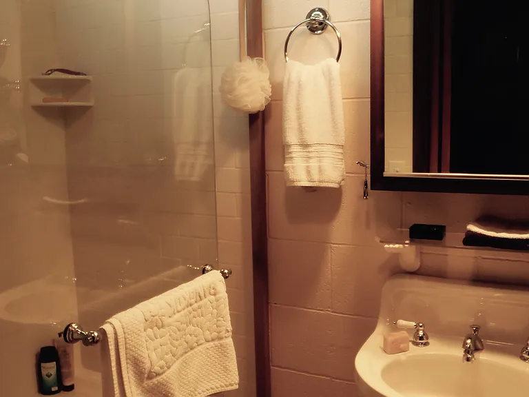 Clerestory windows in shower, tile flooring, heated floors, magnified side mirror