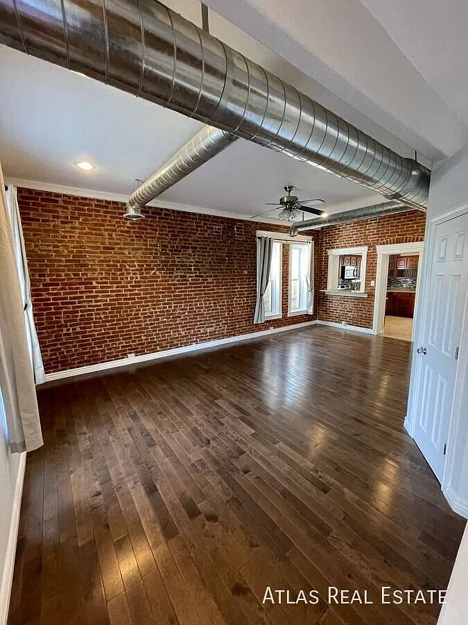 **New Low Price In Baker Exposed Brick, Private Yard & 2-Car Garage — Photo 3