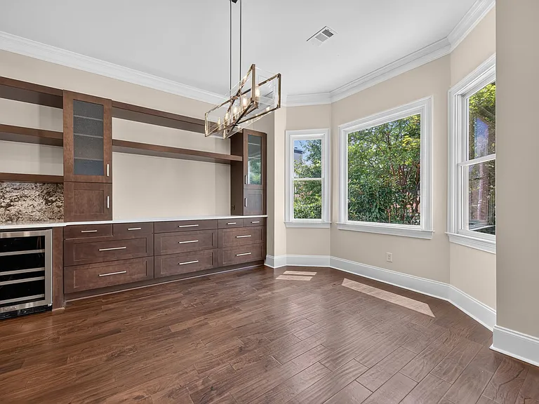 breakfast nook with extra storage and beverage refrigerator