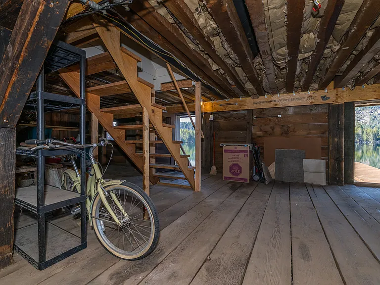 Large Extra Storage Area connected to the unit by the stairs. And opens right out onto the Lake. Great place to store your SUP, skis, bike, etc.