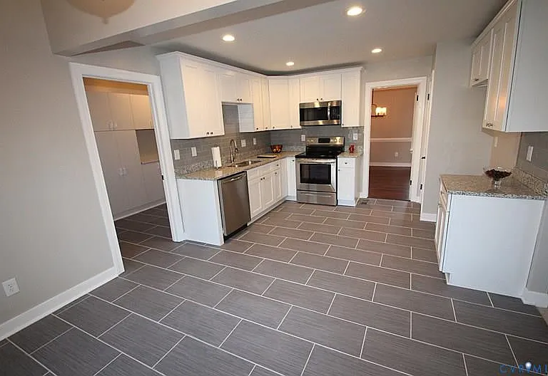 Another view into the kitchen from the breakfast nook area.