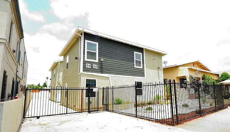 Building Photo - 703 N Soto St #701