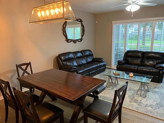 Just past the kitchen in this open concept, are the modern, yet cozy dining and family area! Wait until you see the space of this room!