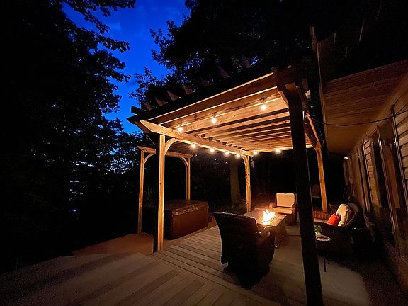 Deck at night, fire table.