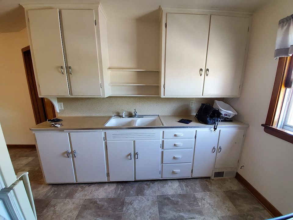 kitchen - lots of cupboards! Electric full-size stove. Full size fridge/freezer included.