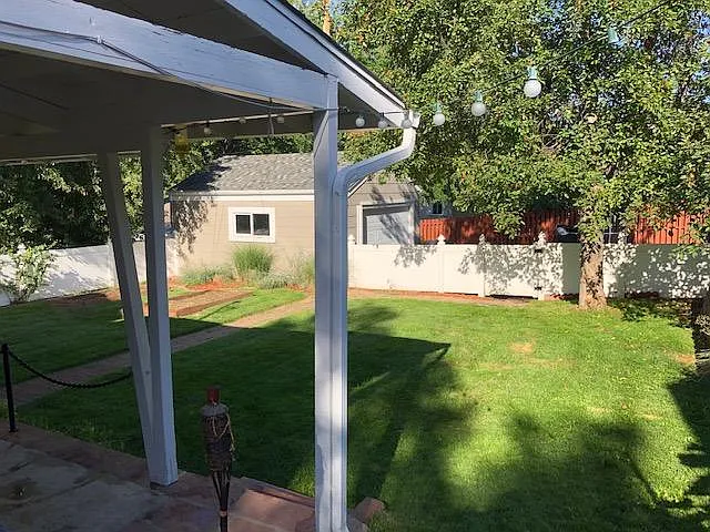 Yard service included mowing, sprinkler service and seasonal rake and gutter clean.