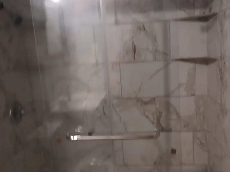 Shower in bathroom downstairs