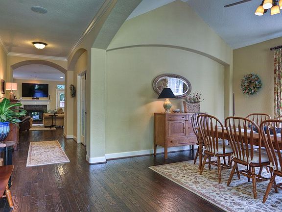 Lovely Formal Dining Room Boasts High Ceilings, Wood Floor and Two Large Picture Windows!