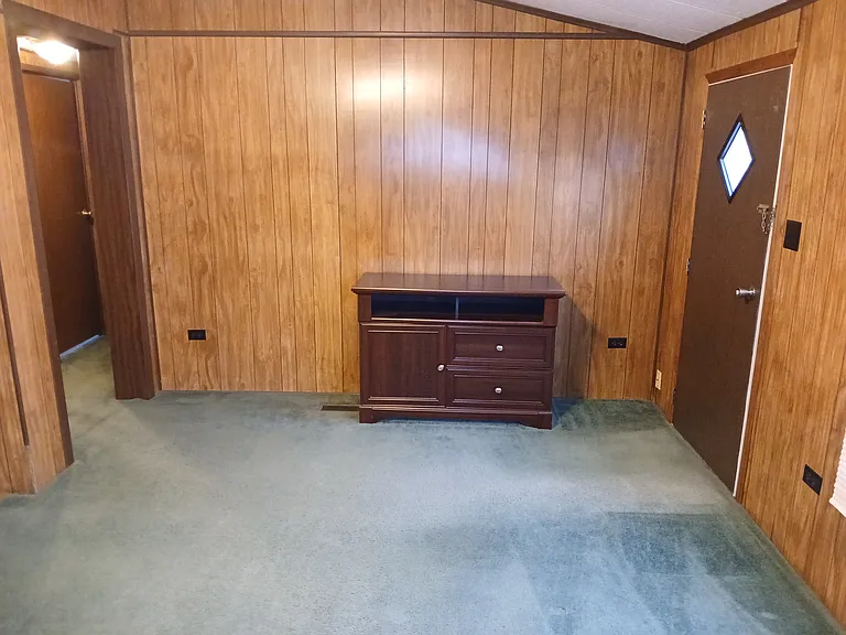 Living Room, Hallway to bath and 2 Bedrooms on left
