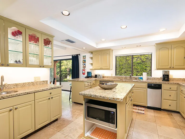 Kitchen with dishwasher, double ovens, gas stove, crystal closet.