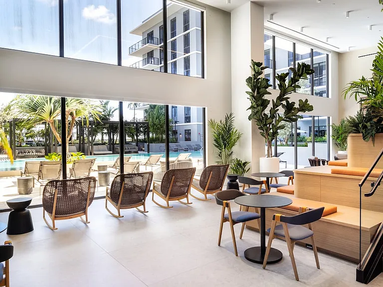 Lower-level resident lounge with multiple seating areas