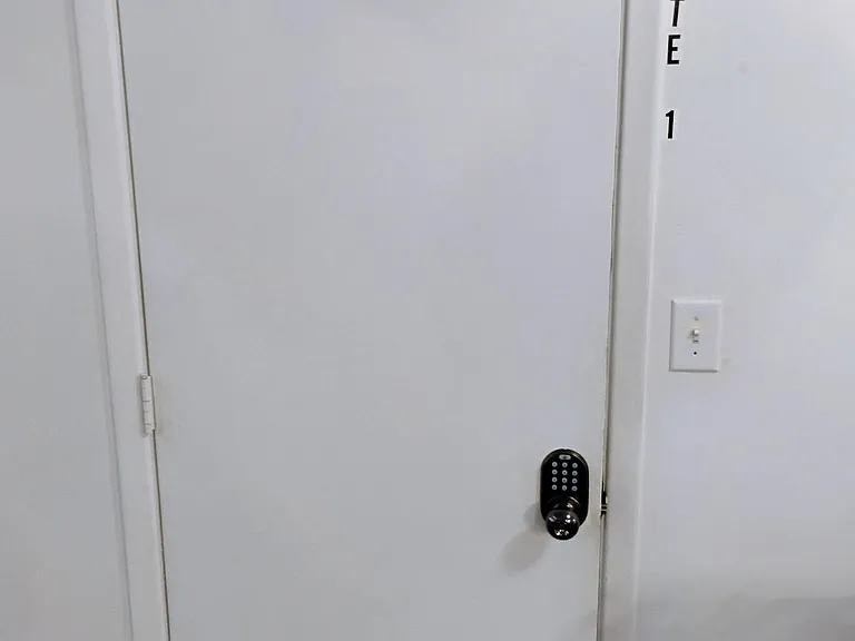 Closed door to Suite #1