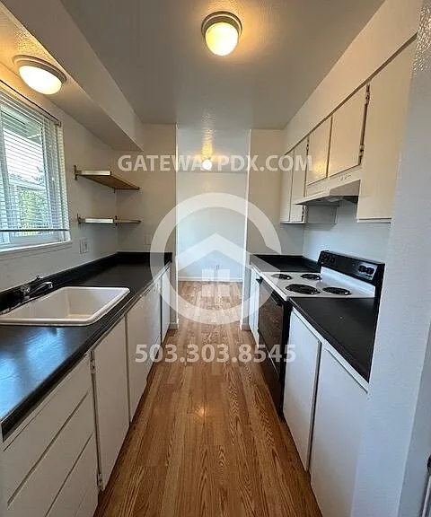 1441 NE Paropa Ct — Photo 14