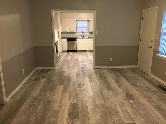 Living area #2 to Kitchen. Door shown is into backyard.