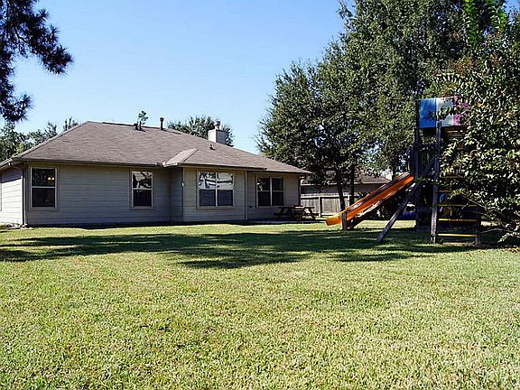 Plenty of space for hosting a backyard BBQ or kids to run and play.