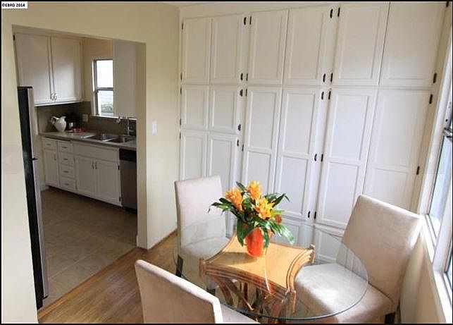 Dining room with floor to ceiling storage