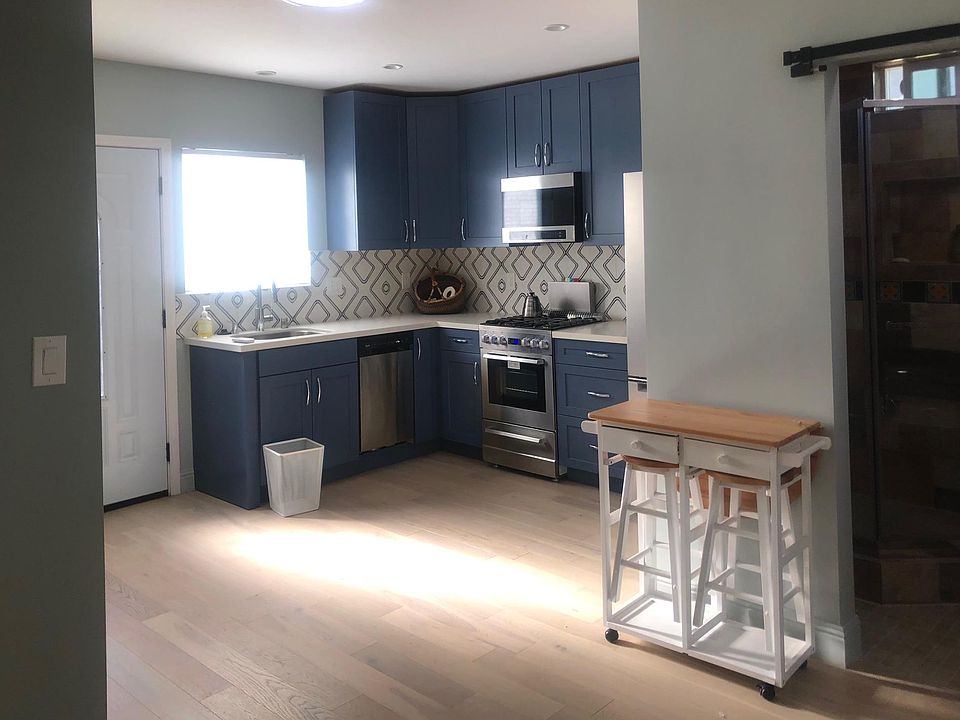 Great kitchen with dishwasher, microwave, range with oven, and full size fridge. Lots of cabinet space. (Includes utensils, pots and pans, flatware, and dishes)