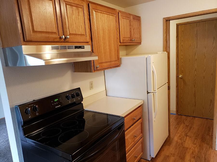 New kitchen cabinets and glass-top stove