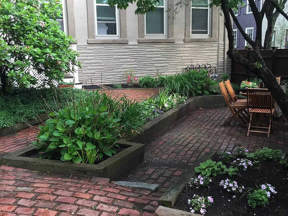 Fenced-in patio is shared with 3 other units.