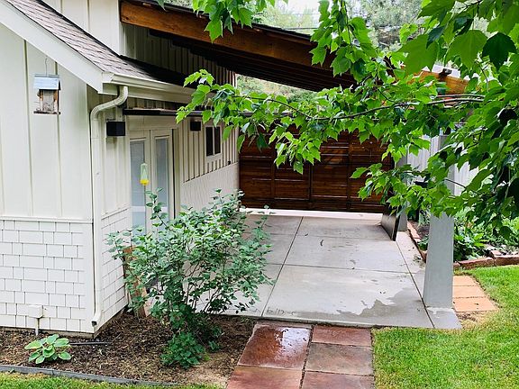 Carport with gated access Or, patio for entertaining