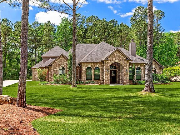 Custom landscaping, with full sprinkler system. Deer resistant plantings