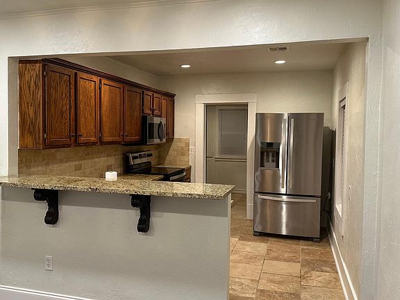 Wonderful size bar overlooking the kitchen.