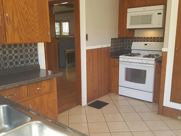 Kitchen with ceramic flooring