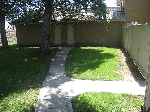 Path from patio to large 2 car garage
