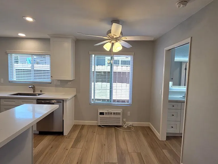 The unit features a wall A/C and heater.