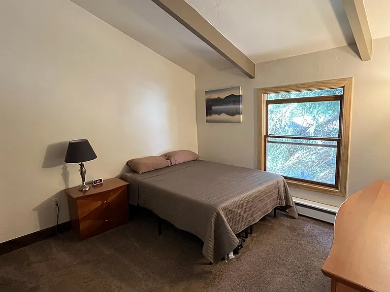 Bedroom 2 with queen bed.