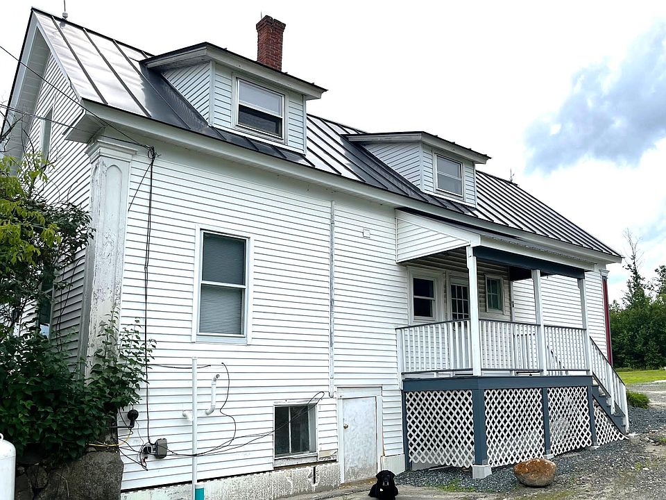 private entrance with bicycle or other storage under deck