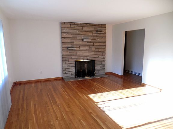 Living Room With A Brick Fireplace