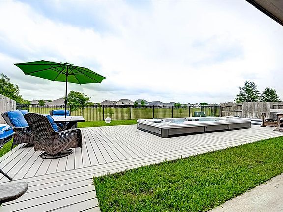 Can you imagine coming home to this recent deck, and a relaxing Master Spa H2X Trainer 19D swim spa?