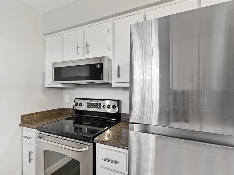 308 Dorchester Sq — Photo 3