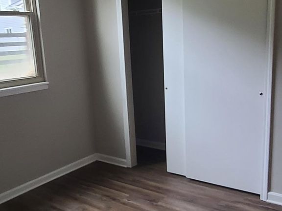 large closet in guest bedroom. Runs wall to wall