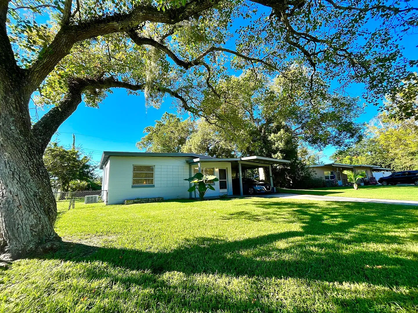 Lawn Service included with this 2BR/1BA w/Carport, Office, and Bonus Room — Photo 2