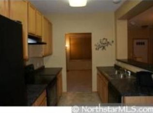 11330 Chisholm Cir NE UNIT E, Blaine, MN 55449