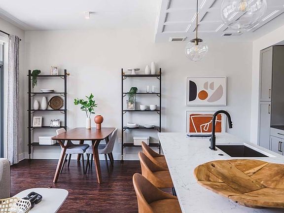 With chic quartz countertops and striking pendant lighting, your home is ideal for hosting.