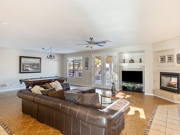 Living Room off kitchen with backyard access.