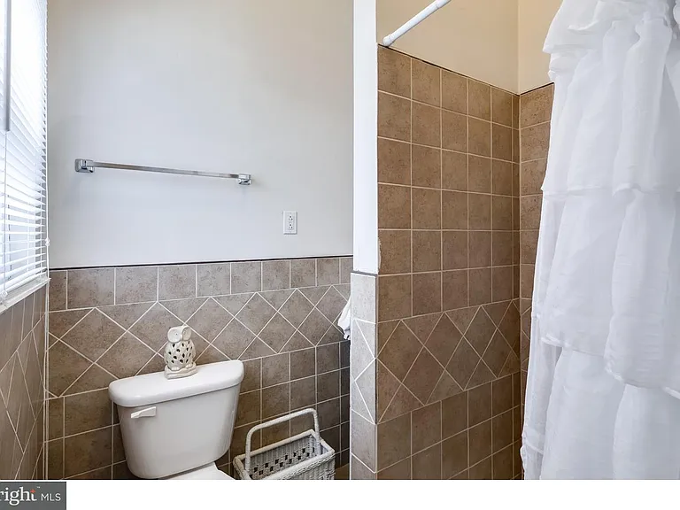 Attached bathroom to rear bedroom