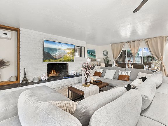 Step into comfort! Our cozy living room is perfect for relaxation together.