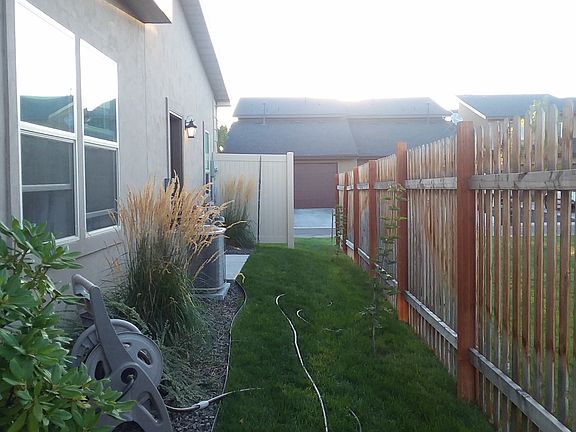 Side yard, by common area.