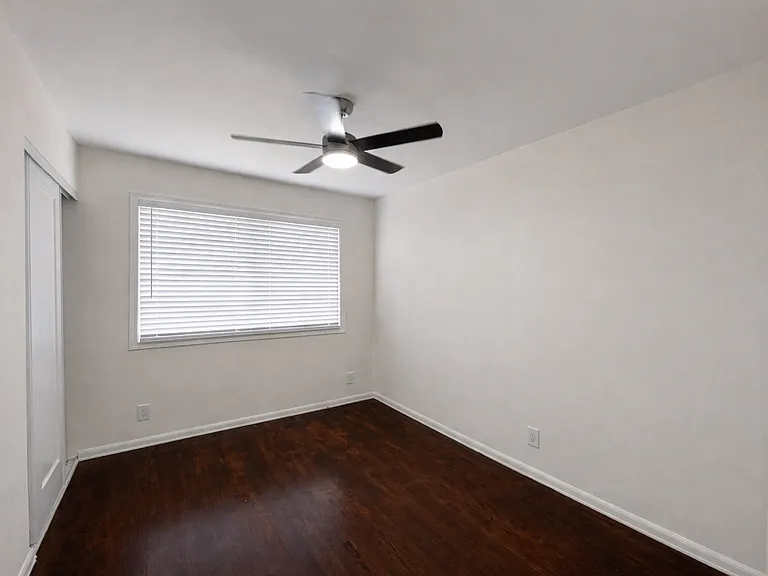 Newly remodel bedroom with closet and ceiling fan