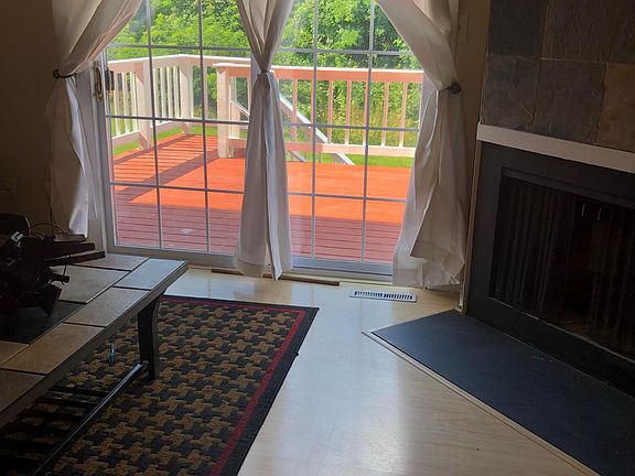Living room leading out to deck.