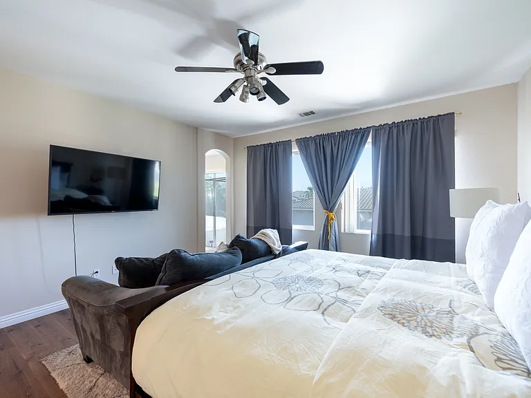 Large main bedroom with French doors