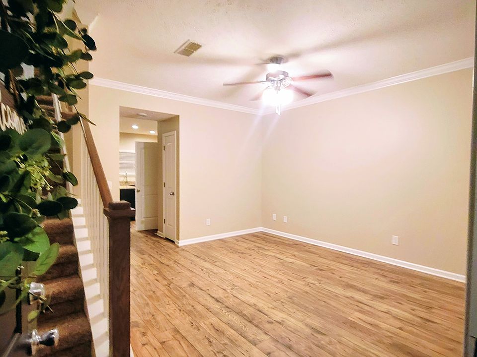 Open living room through front entrance