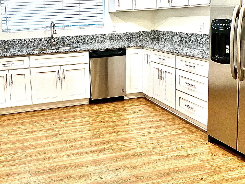 kitchen with Dishwasher & refrigerator, room for breakfast table
