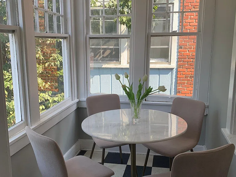 Breakfast nook/small dining area, overlooking backyard